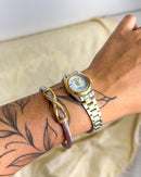 Bracelete Torcido X Cravejado - Semijoia em Aço Inox em Ouro