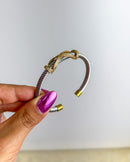 Bracelete Torcido X Cravejado - Semijoia em Aço Inox em Ouro