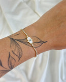 Pulseira Cravejada Mão Hamsa Madrepérola - Semijoia Folheada a Ouro 18k