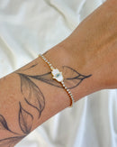 Pulseira Cravejada Mão Hamsa Madrepérola - Semijoia Folheada a Ouro 18k