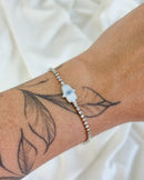 Pulseira Cravejada Mão Hamsa Madrepérola - Semijoia Folheada a Prata