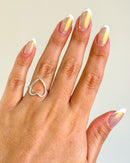 Anel Regulável Coração Vazado - Semijoia Banhado a Prata