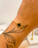 Pulseira Trevo Preto - Dourada - Áurea Acessórios