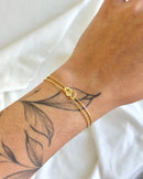 Pulseira Dupla Coração Entrelaçado - Semijoia Banhado a Ouro 18k